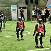 Fußballspiel bei den ersten World Humanoid Robot Games in China.