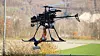Top 4 Aerial_Manipulation_1440x810 Autonomer Doppelrotor-Hubschrauber mit Roboterarm beim Flugversuch