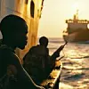 Armed Somali pirates attack container wessels at sea.