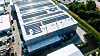 Bei mehreren Kunden von Greenflash ist die neu entwickelte, KI-basierte Software Greencore AI bereits im Einsatz und generiert massive Kosten- und CO2-Einsparungen. Das Bild zeigt das Energiesystem mit PV und Speicher der Unternehmen Giga Coating und System Trailers in Twist im Emsland, mit einer Gesamtleistung von mehr als 2 MWp.